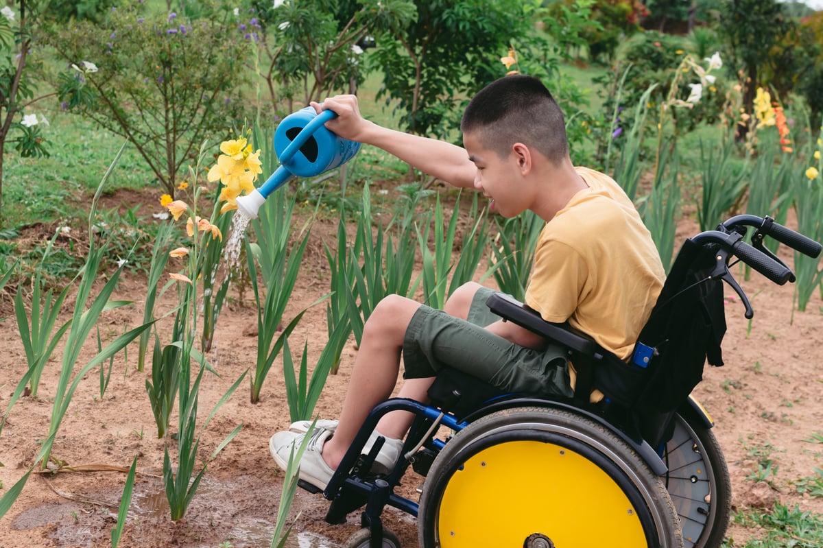 Boy gardening outside